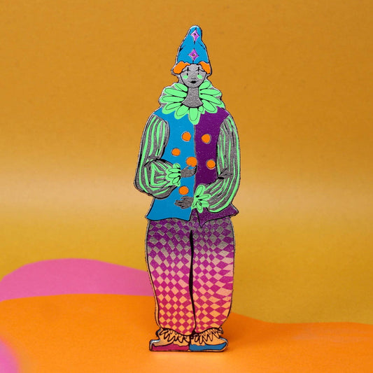 Close-up of the shiny and matte foil details on the leather clown bookmark