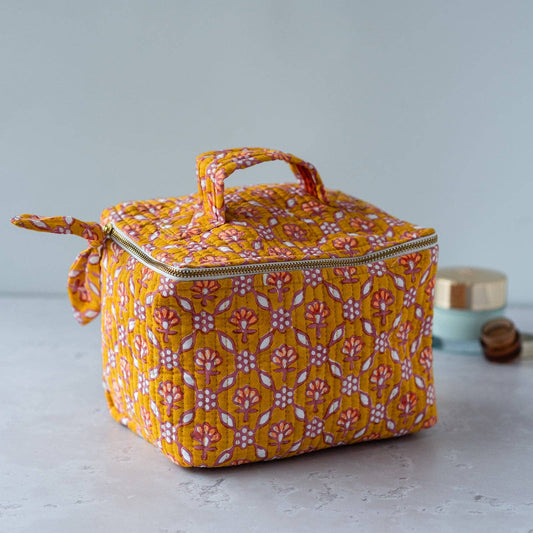 Top view of the Nectar Petal cosmetic bag showing the carry handle