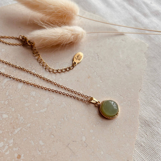 Polished jade circle pendant necklace by Little Nell, water-resistant and hypoallergenic