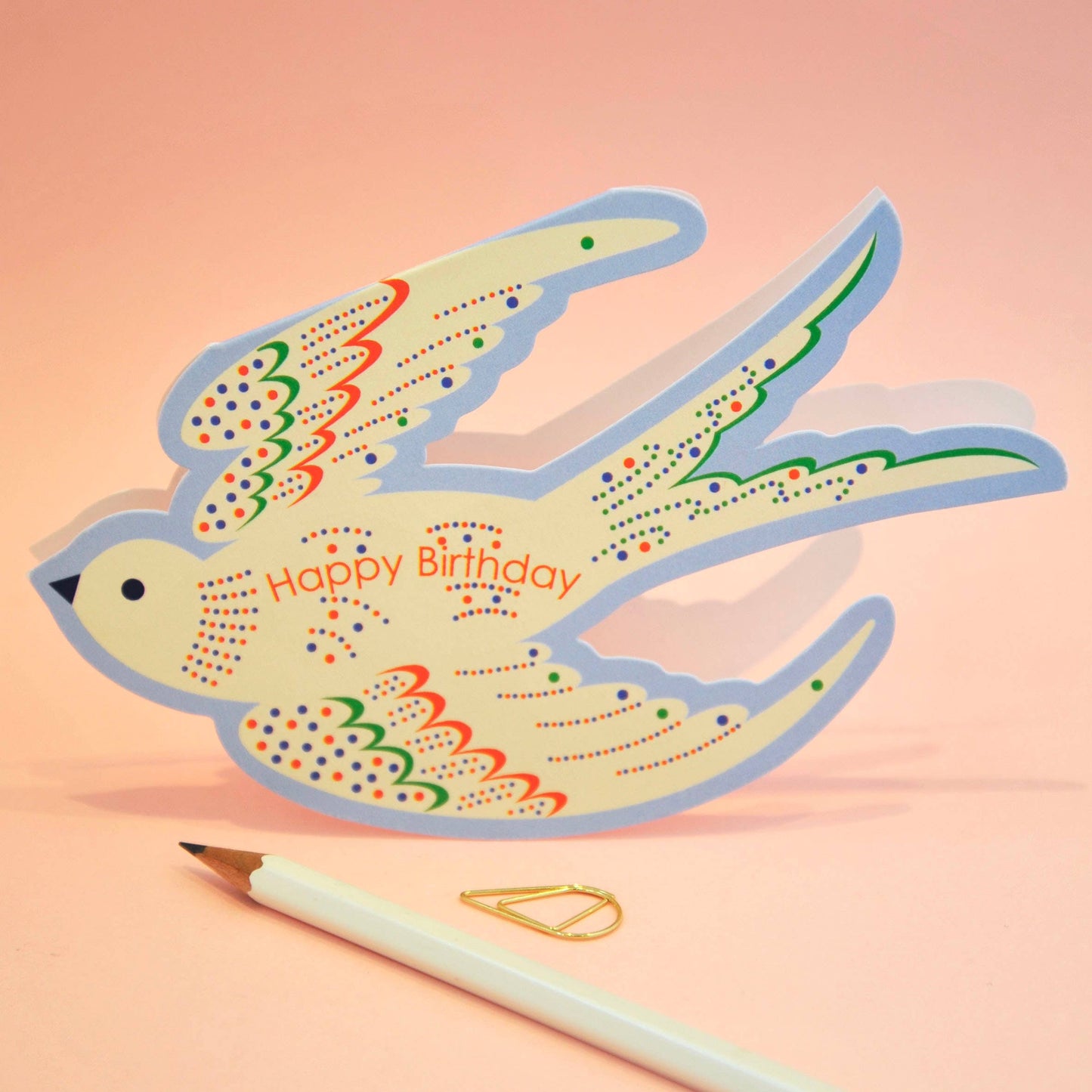 Front view of a whimsical blue rocking bird birthday card