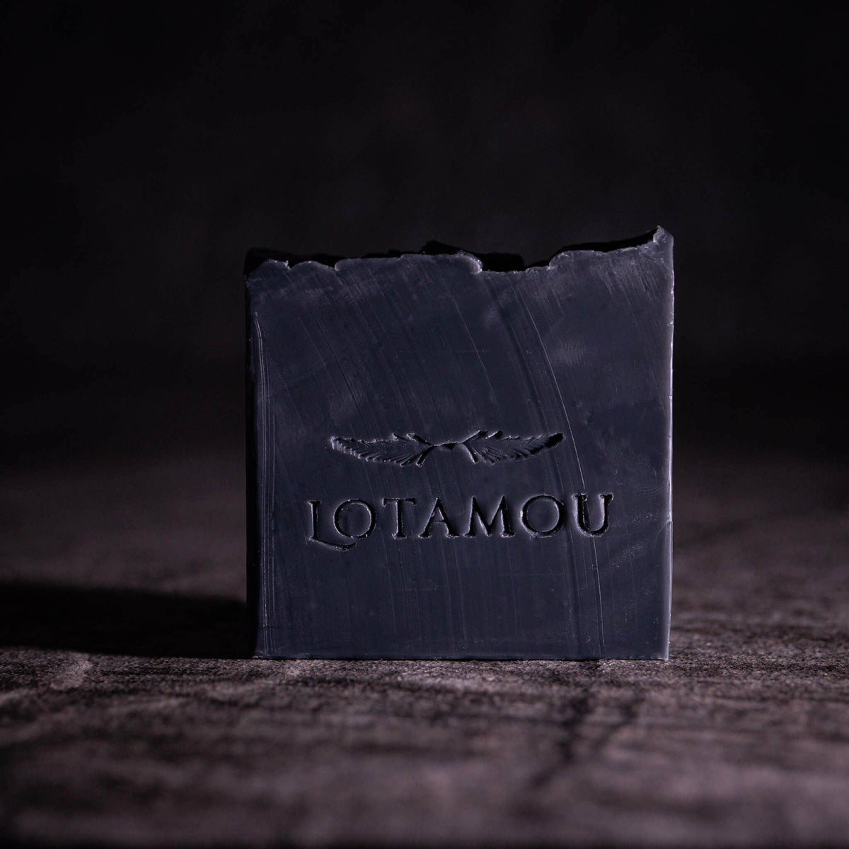 Handmade Dark Patchouli and Sweet Orange natural soap bar in a black gift box