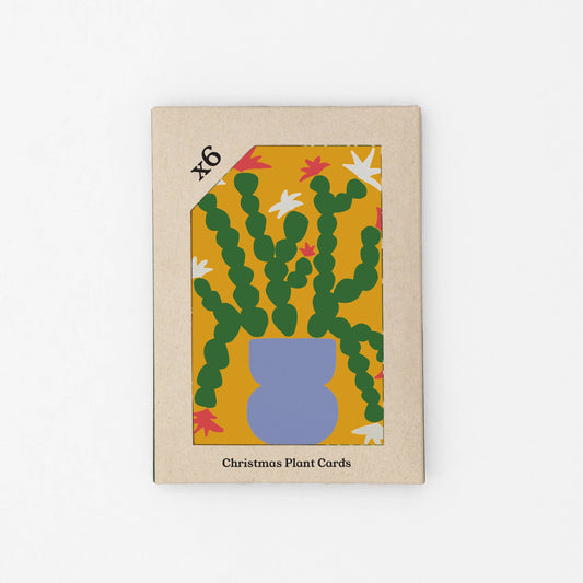 Pack of six botanical Christmas plant cards in a greyboard gift box