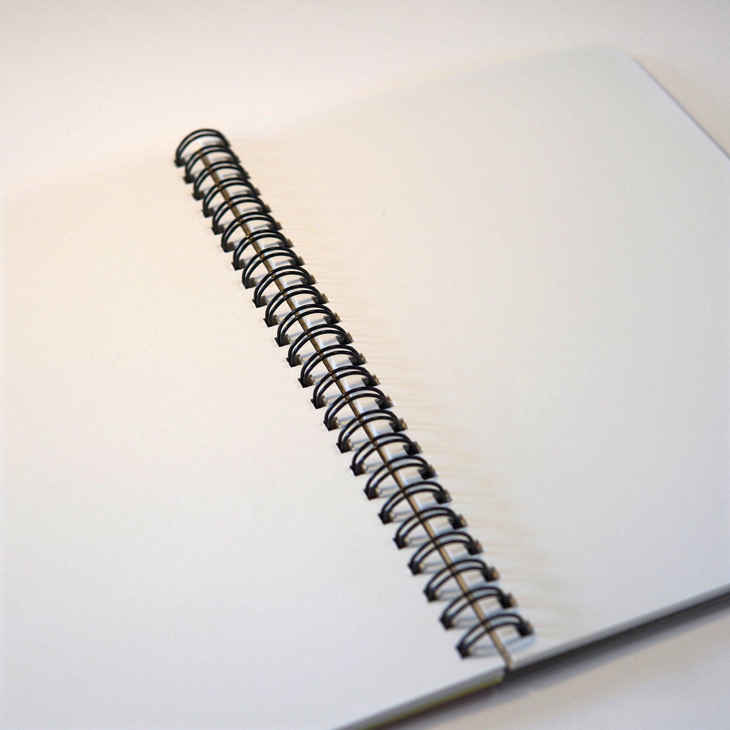 Tactile black textured cover of the Game Over notebook