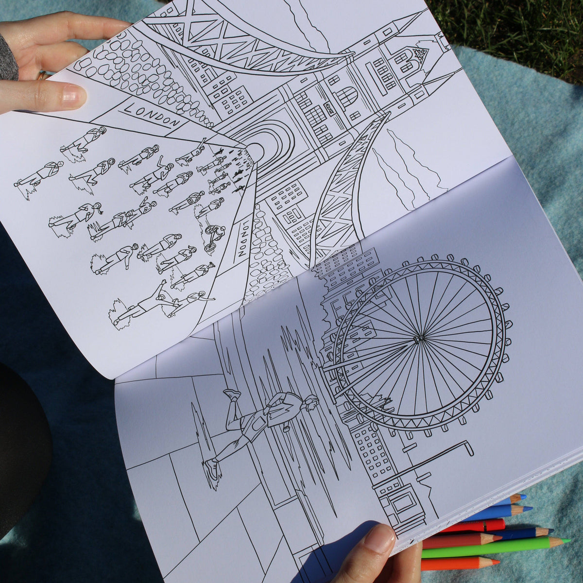Inside page of Running London adult colouring book showing runners