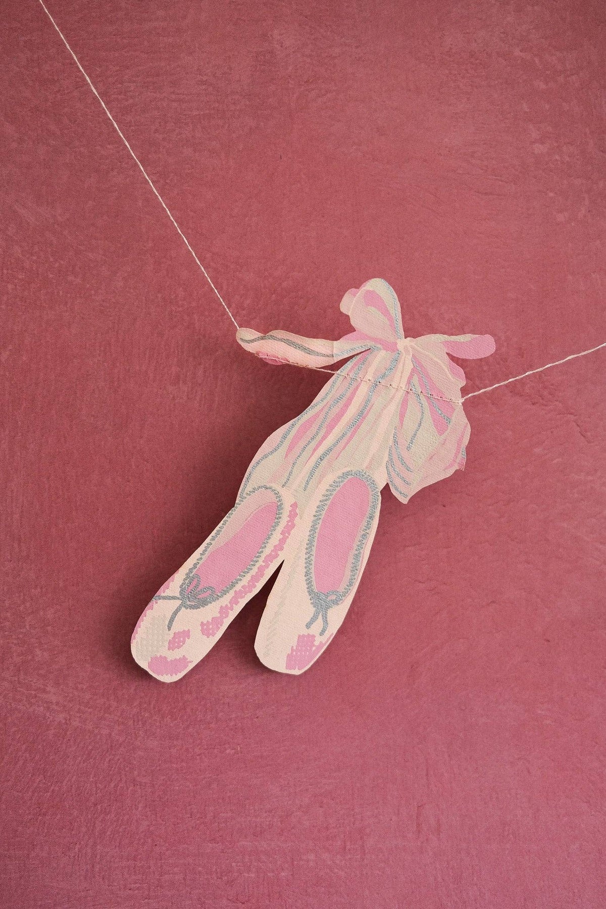 Handcrafted ballerina bunting with shimmering silver accents