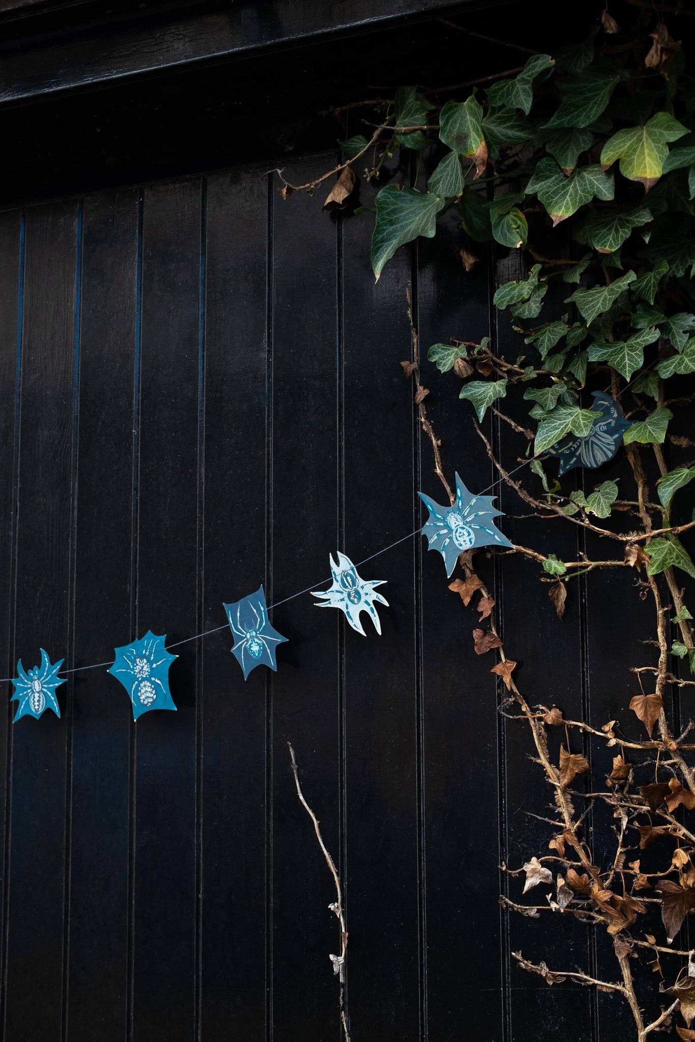 Hand-sewn recycled Halloween garland with 20 spooky screen-printed spiders