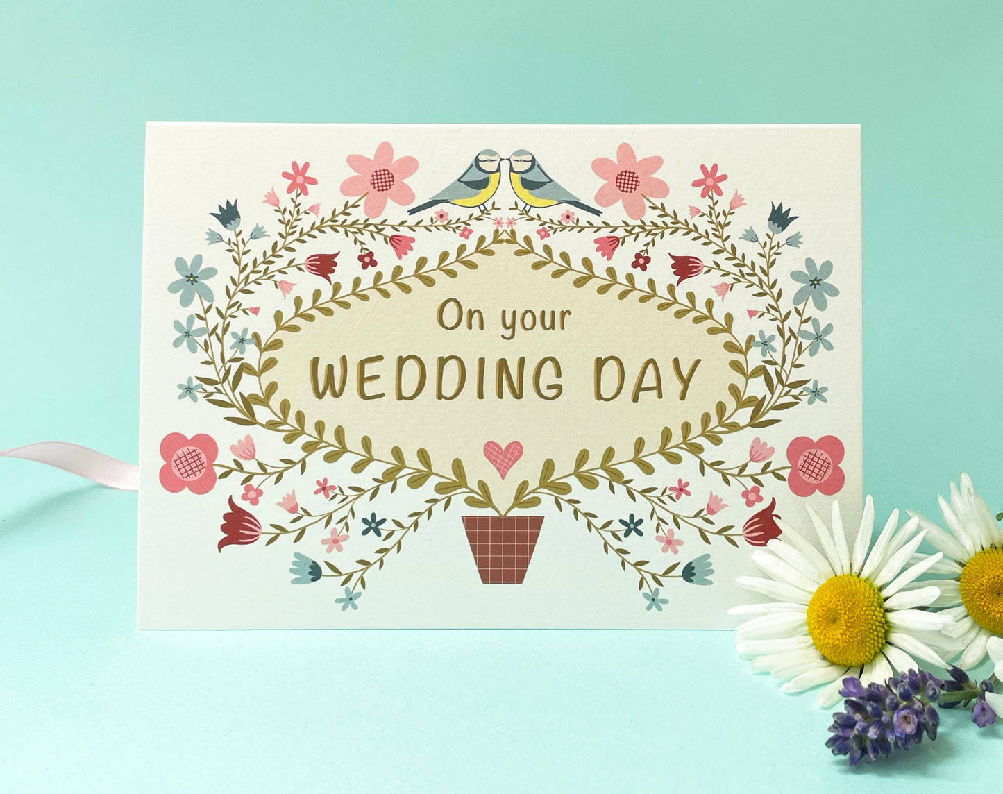 Close up of the textured sustainably sourced Tintoretto Gesso wedding card