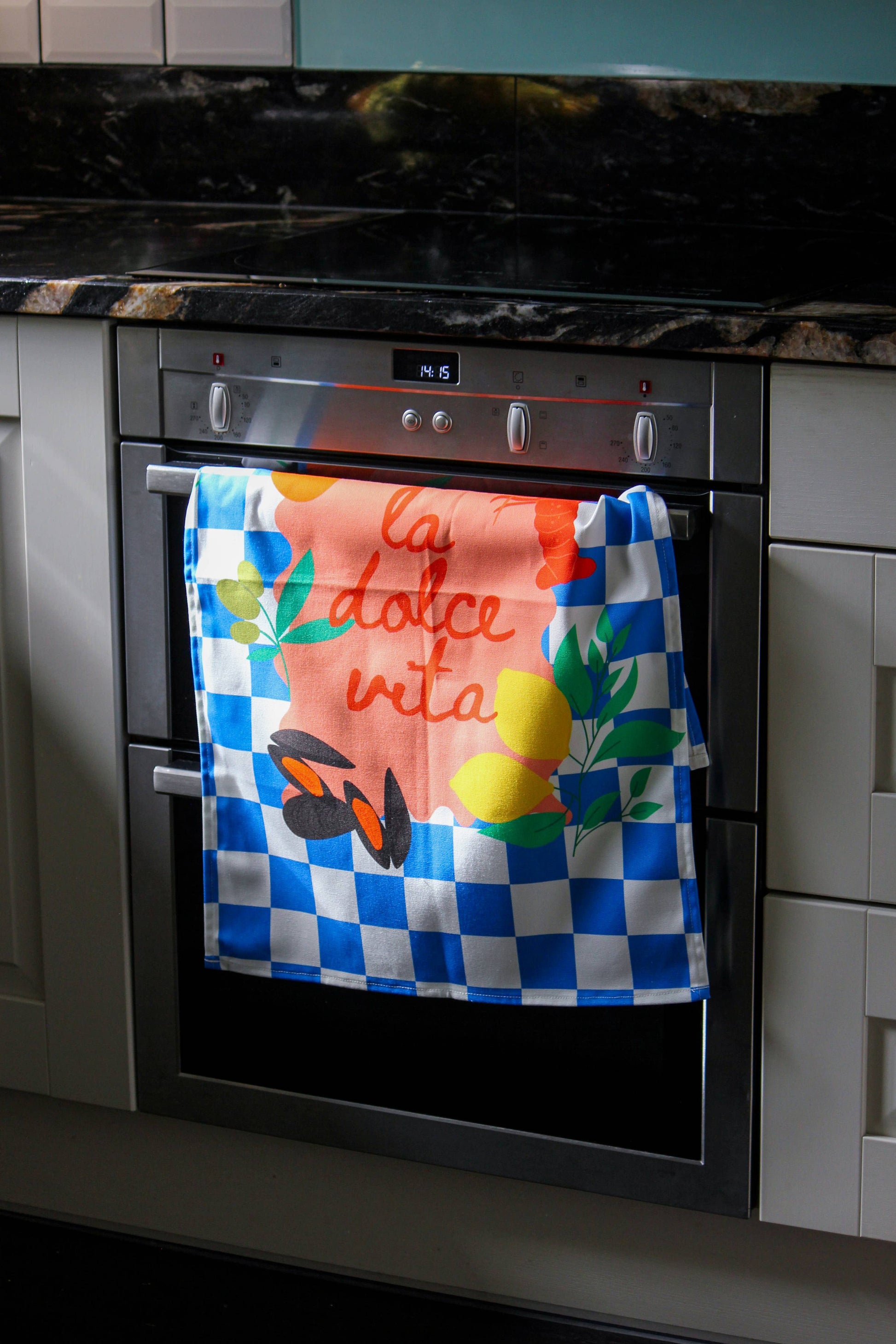 Lifestyle view of Mediterranean style tea towel in a kitchen setting
