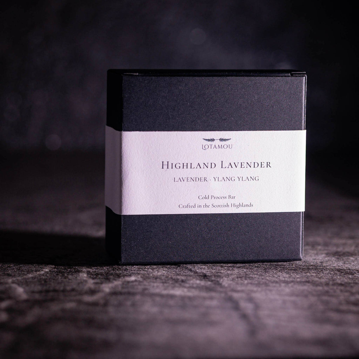 Handmade cold-processed lavender soap being lathered