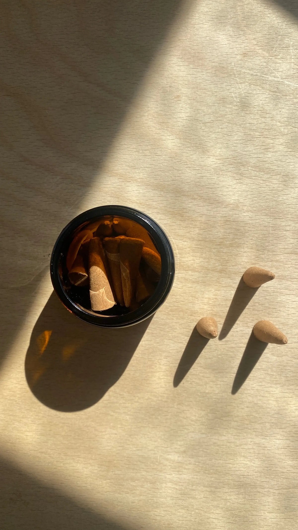 Hand-rolled natural essential oil incense cones by Bouclé