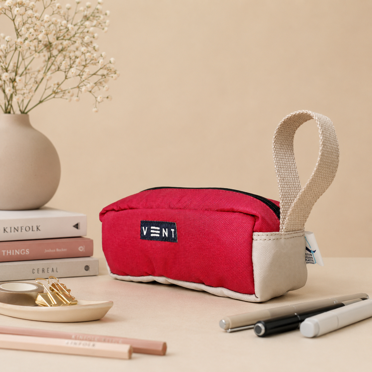 Close-up of secure zip closure on raspberry pink ocean plastic pencil case
