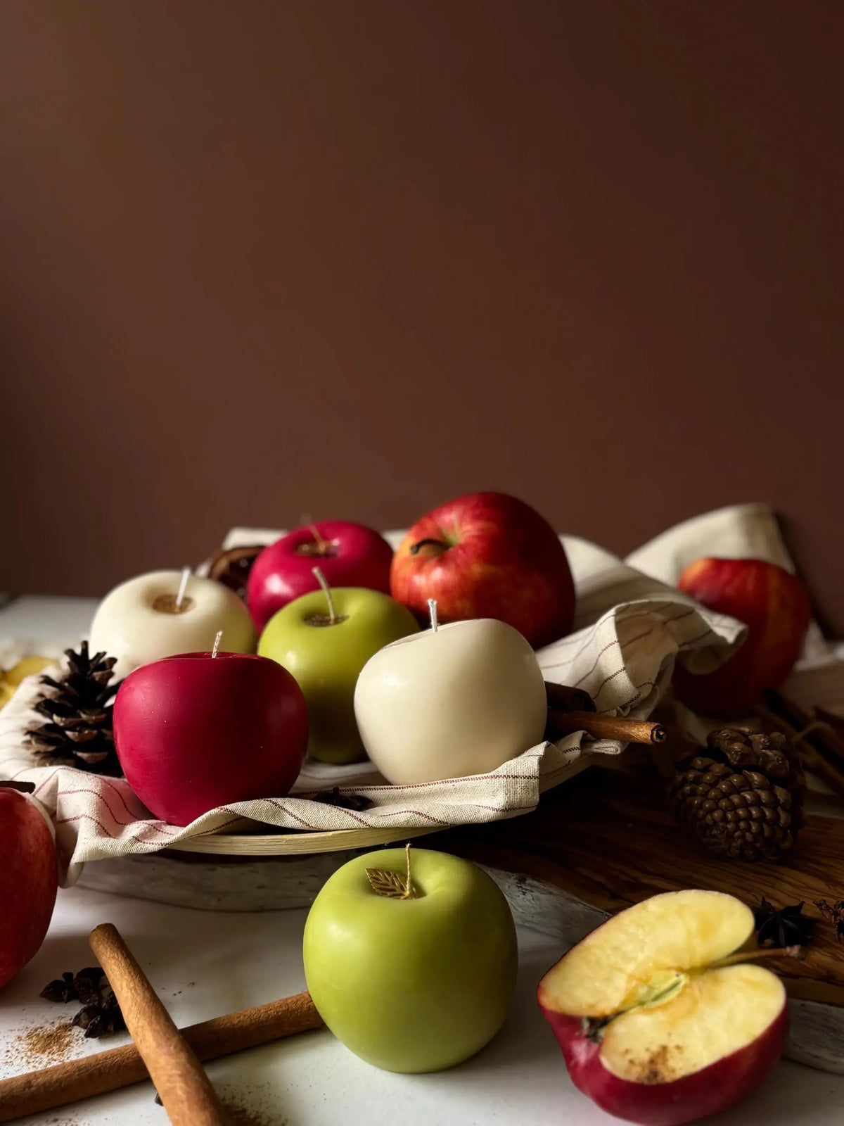 Cosy autumn home decor with apple candle