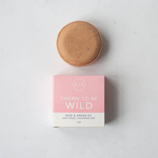 Plastic-free shampoo bar with plant-based ingredients for hair nourishment.