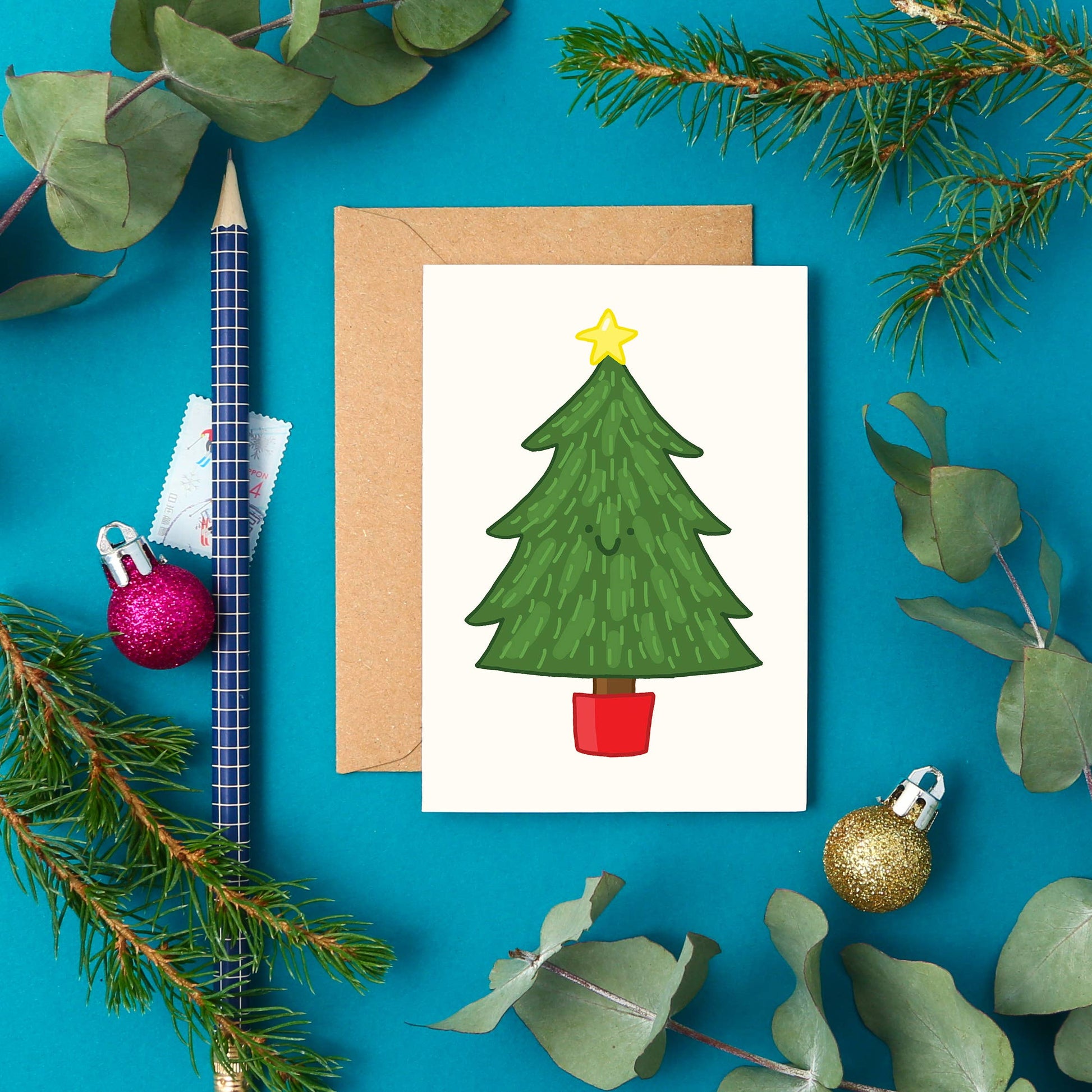 Mini Christmas Tree card, hand-drawn evergreen with star, happy face, UK-made sustainable paper, A7 size