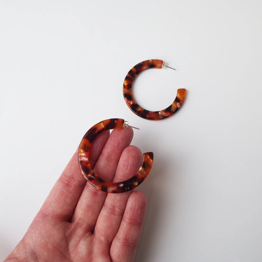 Side view of Rosa Tortoiseshell Large Statement Acetate Hoop Earrings