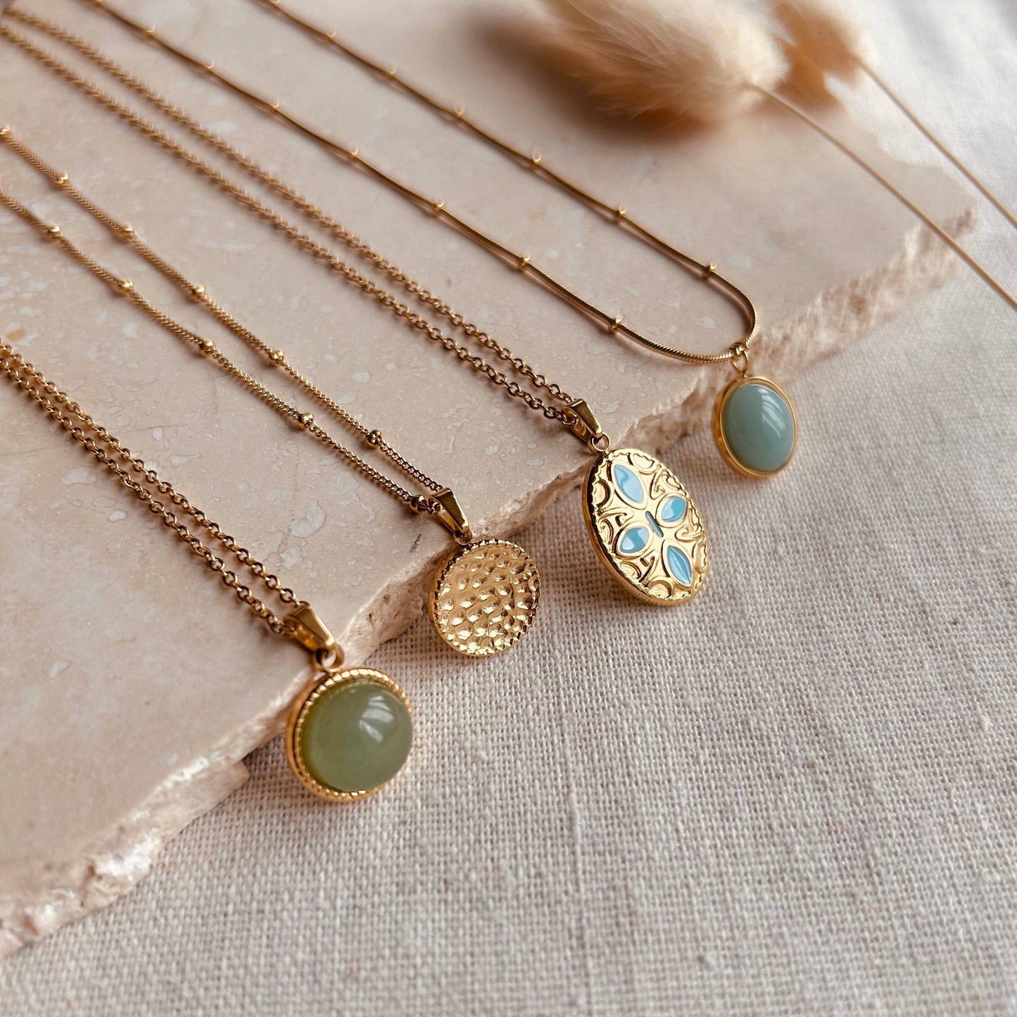 Polished jade circle pendant necklace by Little Nell, water-resistant and hypoallergenic