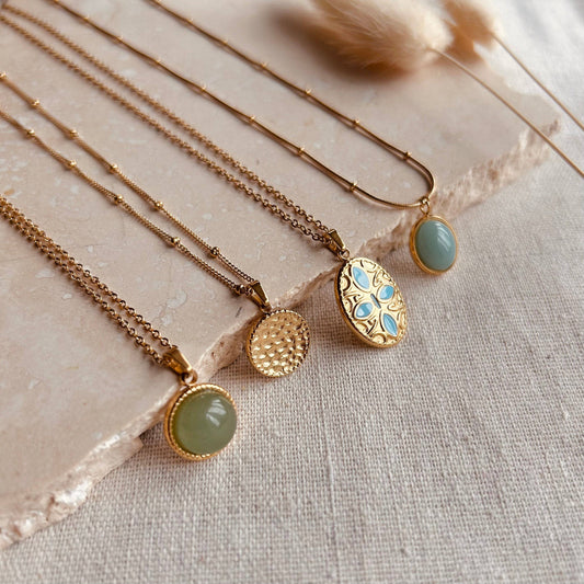 Elegant Little Nell Jade Pendant Necklace on model, showcasing 18K gold-plated chain
