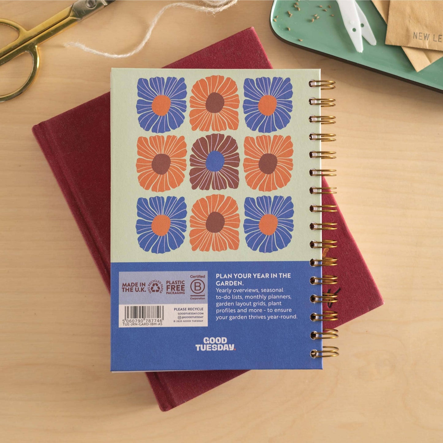 A5 In Bloom Gardeners Journal with gardening tools, lifestyle shot