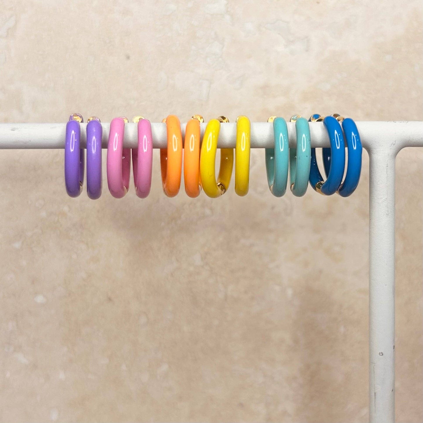 Candy Enamel Hoops, with gold plated fixings. 6 colours available, blue, green, yellow, orange, pink, lilac. 17mm wide with comfortable hinge click fastening 