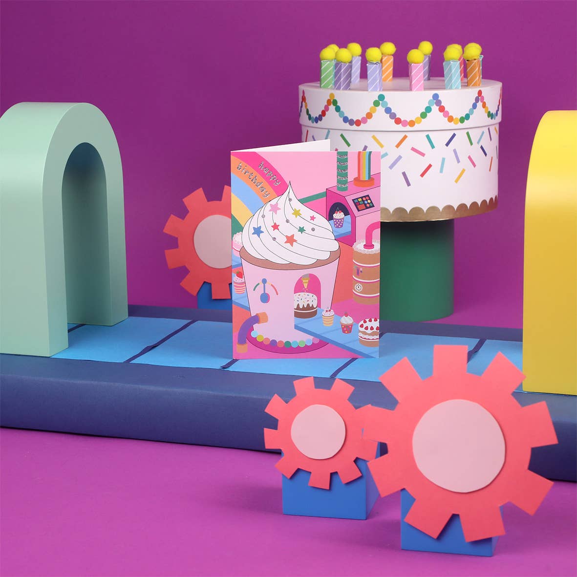 Sustainable 3D cupcake-themed birthday card with conveyor belts and silver foil, made in the UK