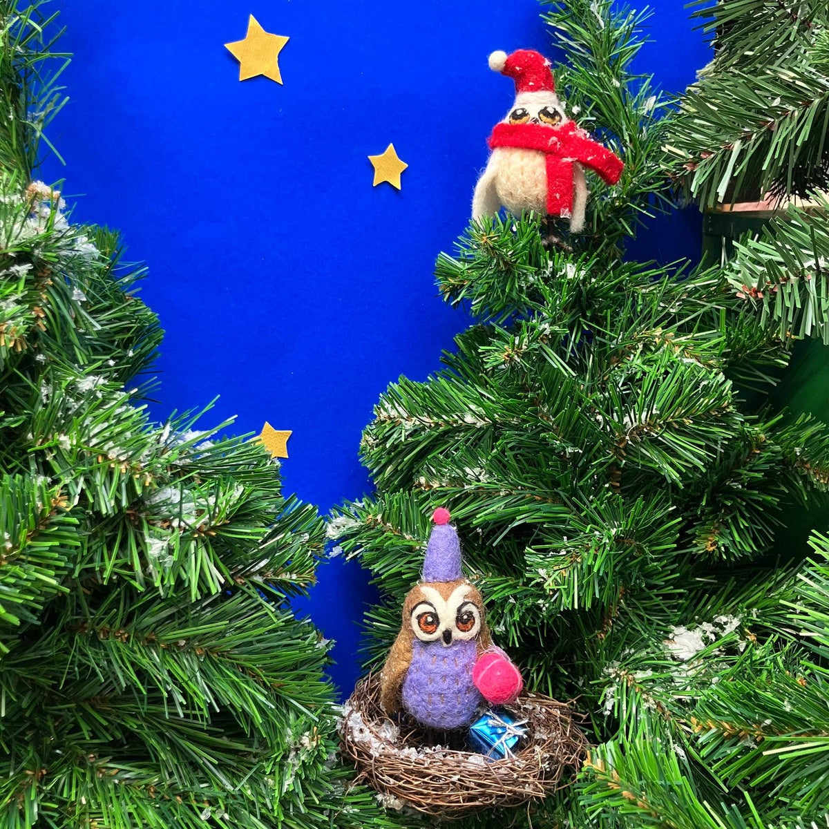 Side profile of felt snowy owl Christmas hanging decoration