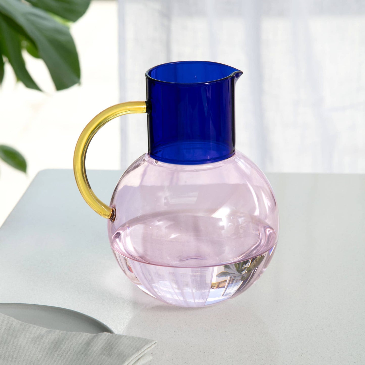 Pablo Large Glass Jug showcasing its vibrant colour and elegant composition