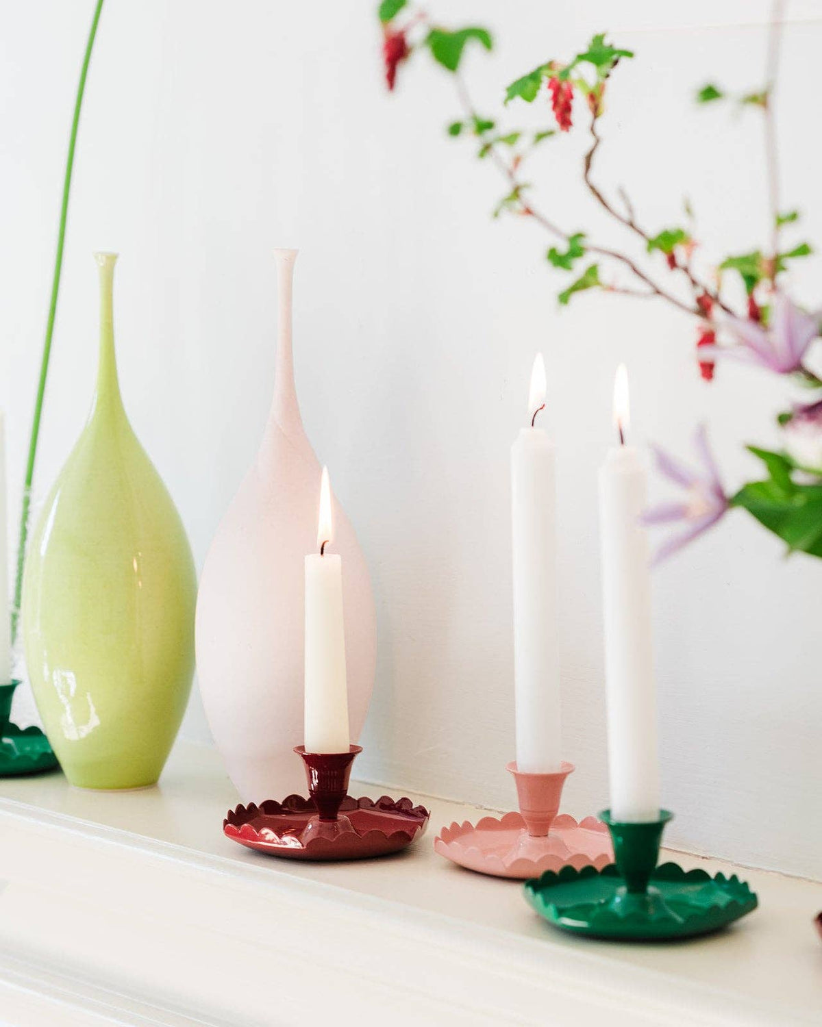 Detail of the scalloped edge on the emerald green candlestick holder