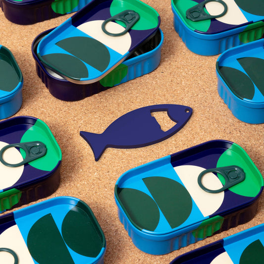 Fish shaped metal bottle opener in deep sea blue