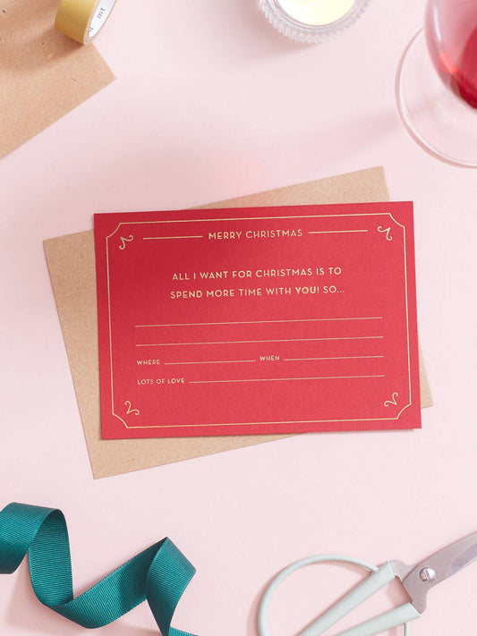 Red Christmas Gift Voucher by Another Loop, gold foil experience token on rich red sustainable card, A6 blank ticket, 100% recycled Kraft envelope