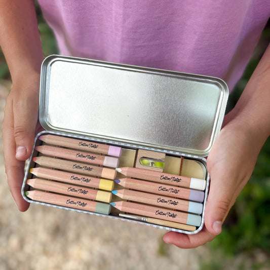 Cotton Twist Pastel Watercolour Pencils Set open tin with pencils, paintbrush, and sharpener.