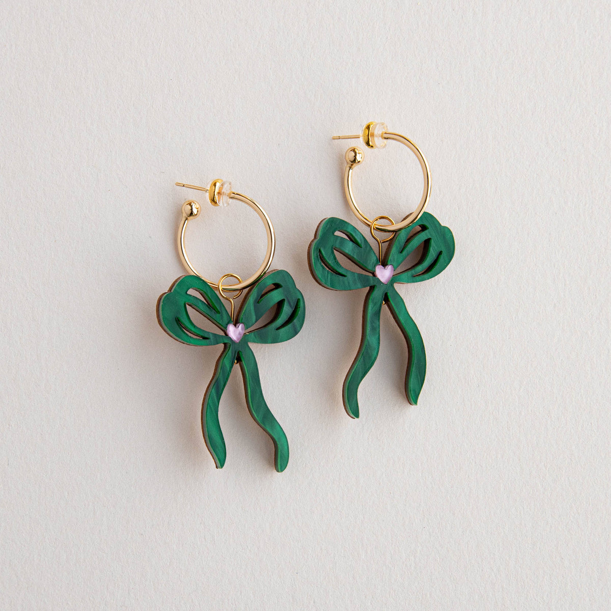Pair of handcrafted British bow statement earrings