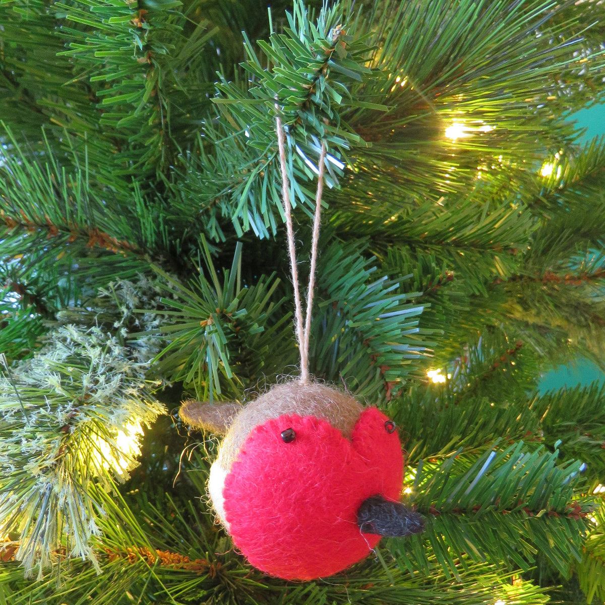 Sweetheart felt robin hanging decoration on Christmas tree