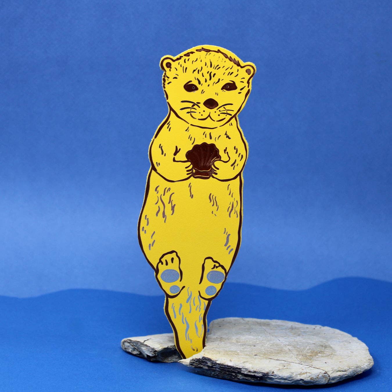 Handmade leather otter bookmark, embossed with Otterly Relaxed, British made by Ark Colour Design.