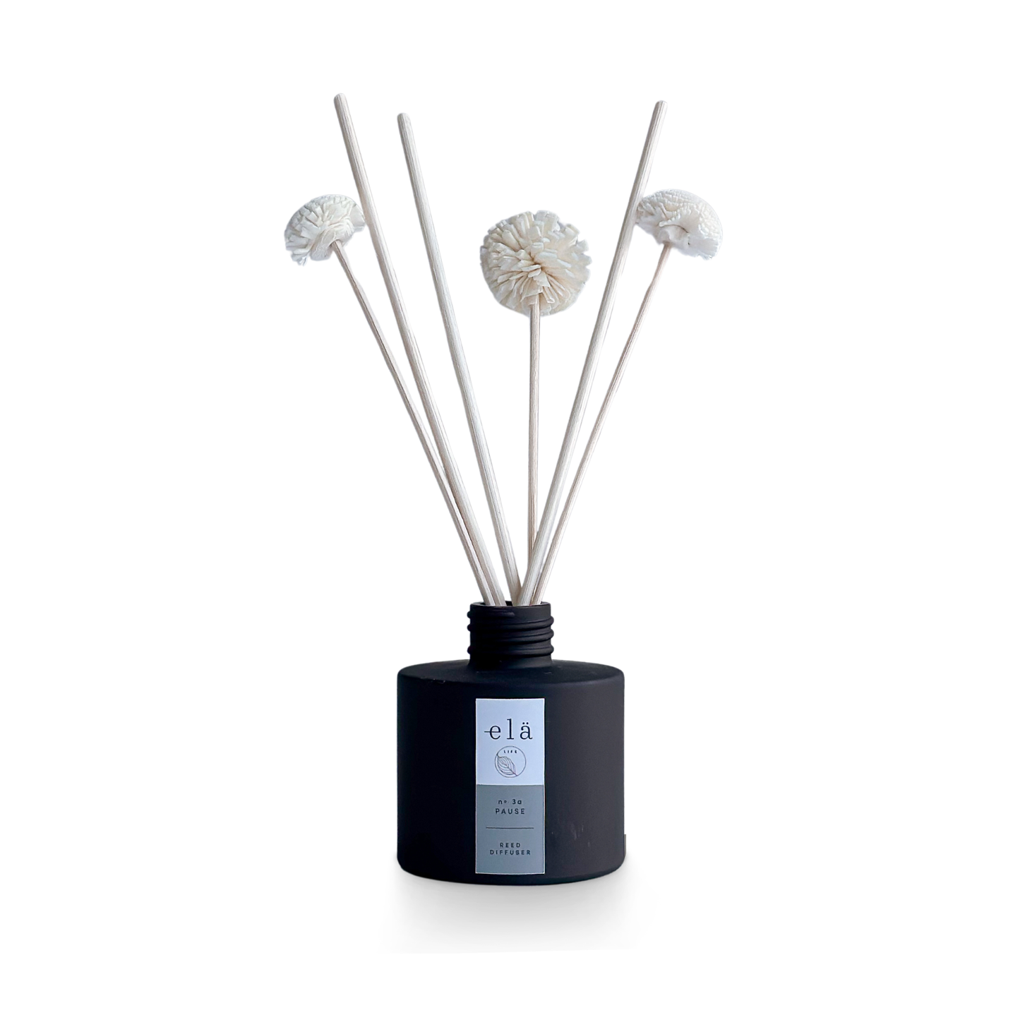 Pause No 3a Pom Pom Diffuser, featuring natural Sola Wood pom poms and an essential oil blend for eco-friendly home fragrance.