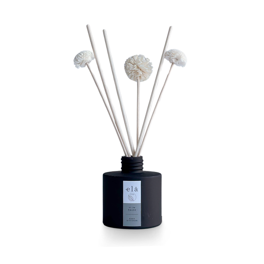 Pause No 3a Pom Pom Diffuser, featuring natural Sola Wood pom poms and an essential oil blend for eco-friendly home fragrance.