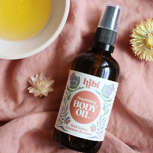 Nourishing Body Oil bottle with botanical ingredients