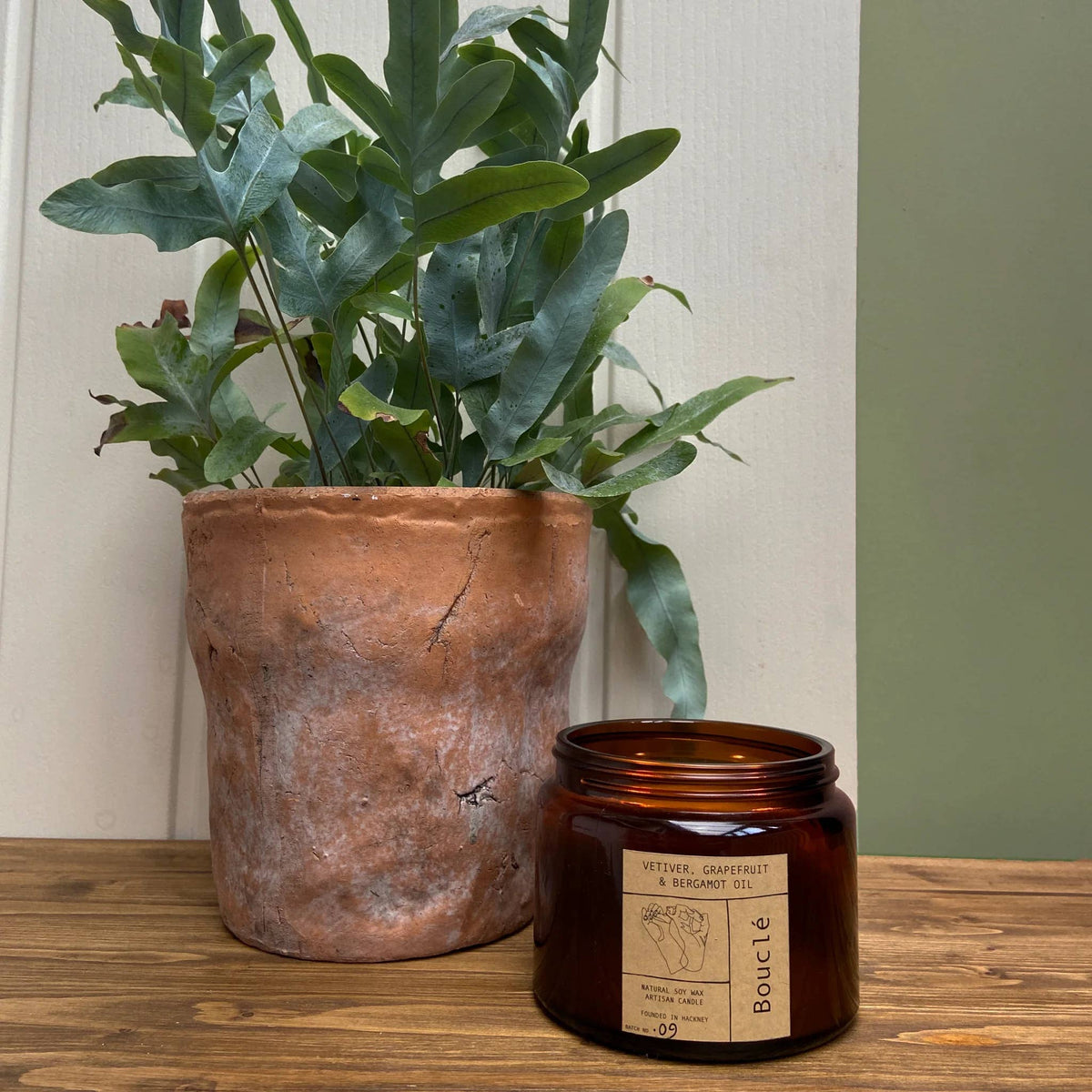 Festive home decor featuring the Boucle winter candle