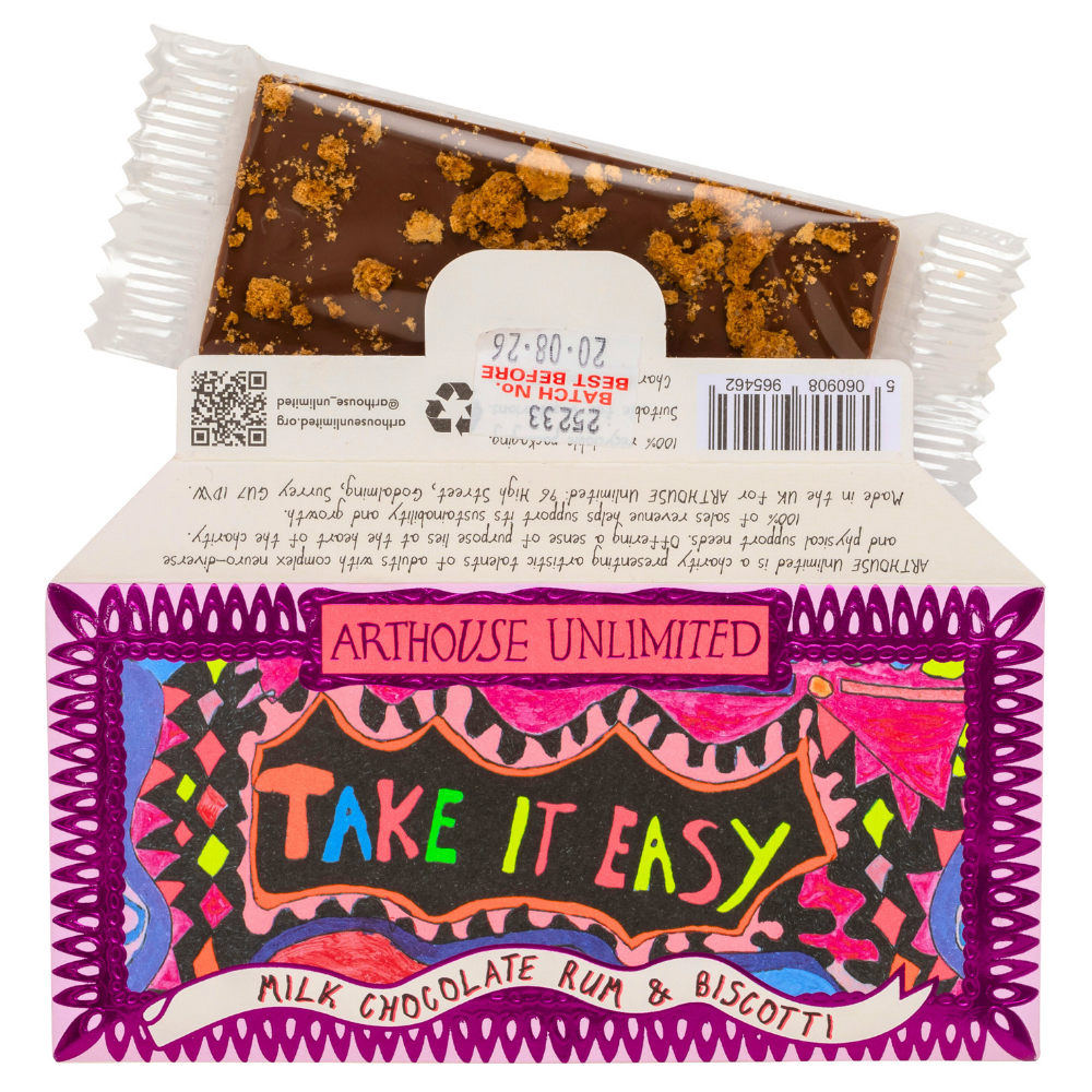 Joy Sized: Take It Easy milk chocolate bar with rum and biscotti flavour, wrapped in recyclable paper with bright artwork by Laura Tregellas.