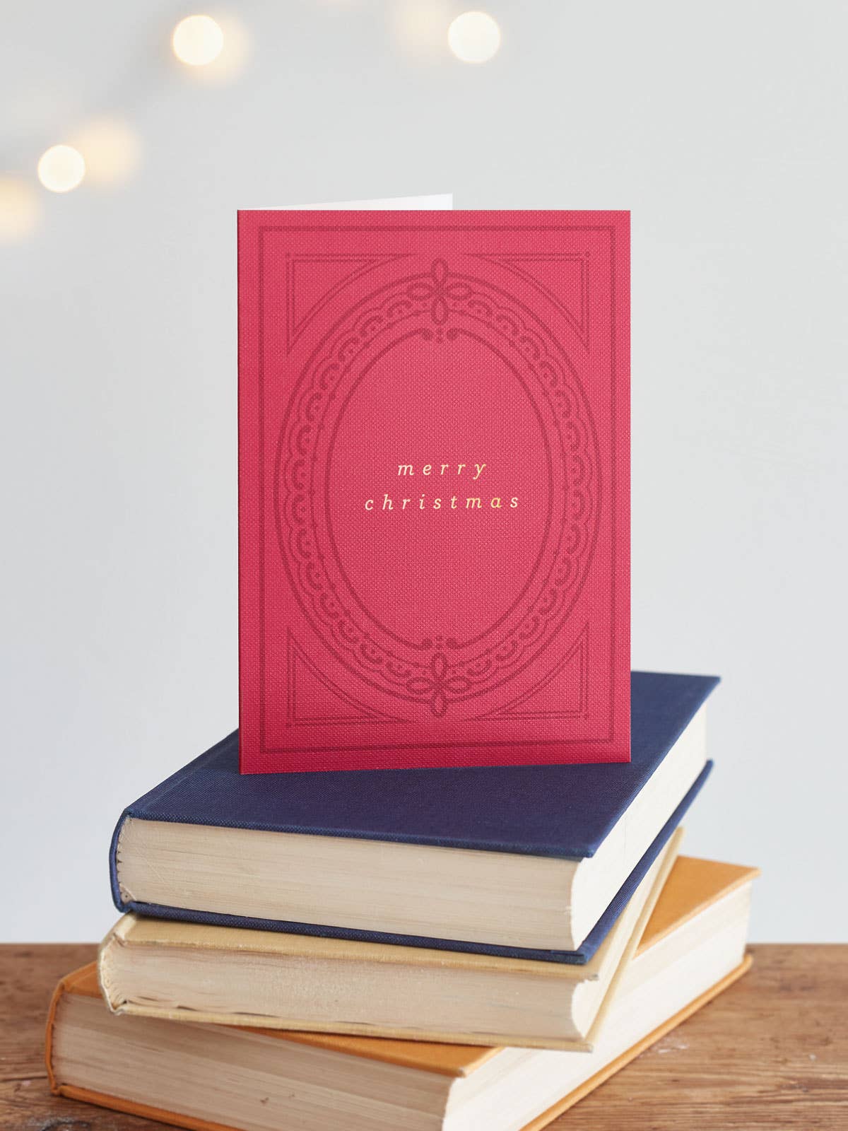 Book Club Vintage Christmas Card Pack of 5 by Another Loop, foil printed on 350gsm Buckram card, recycled Kraft envelopes, plastic-free, A6 size festive sustainability.