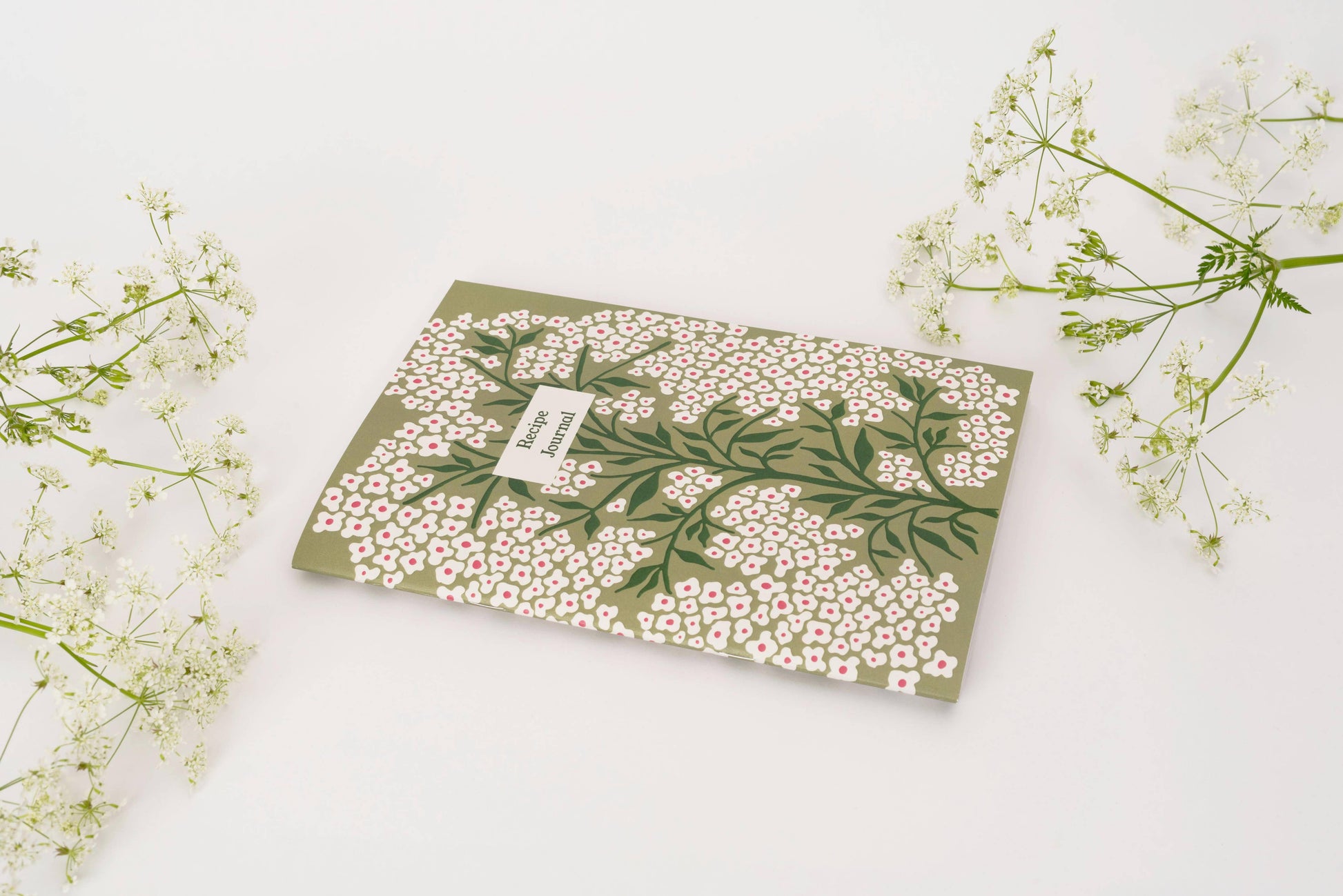 Pages are designed to layout ingredients and method as well as space to draw pictures, staple photos etc. Also includes a namesake page and handy weights and measurements page at the back. Supplied with Bookmark.