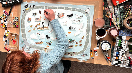 Close-up of Duck Pond illustration on sustainable gift wrapping paper