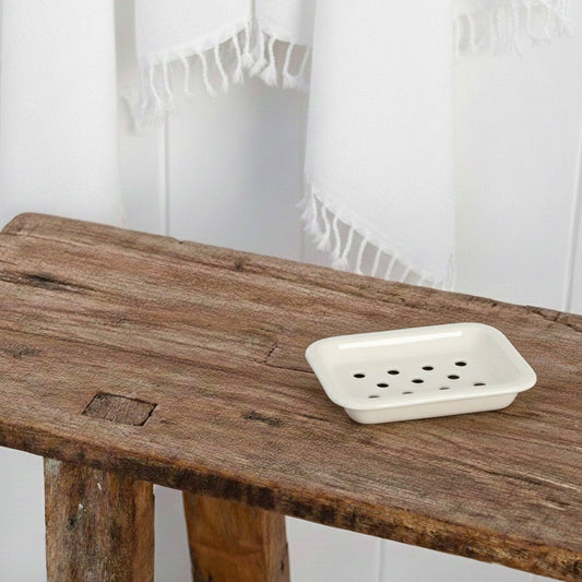 Stone White Enamel Soap Dish on a bathroom shelf