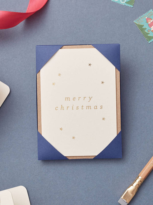 Mini Merry Christmas Card Pack of 5, hot foiled by hand onto recycled coffee cup card, wrapped in eco-friendly paper with recycled kraft envelopes.