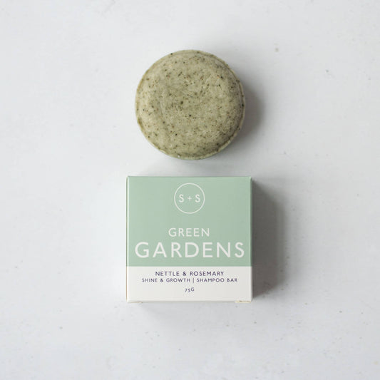 Green Gardens nettle and rosemary shampoo bar with eco-friendly packaging.