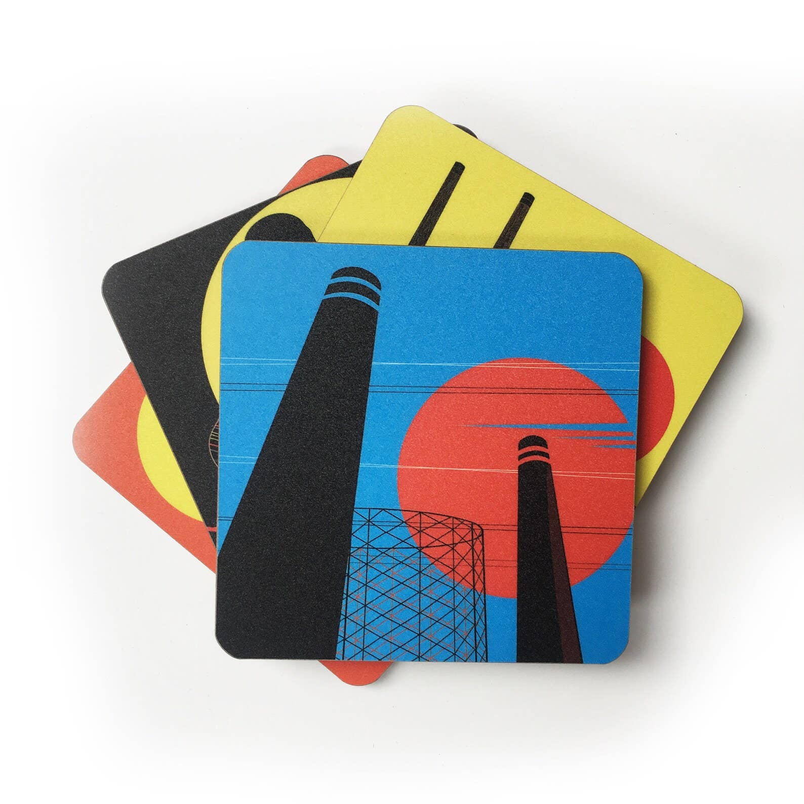 Industrial London Coaster Gift Set. Set of 4 coasters featuring London Landmarks. Battersea, Hackney, Croydon and Brick Lane Gasholders and chimneys. The gritty, not so pretty side of industrial London. Featuring the Battersea Power station, the gasworks at Waddon Marsh Croydon, the chimney of the Old Truman Brewery, and the gas holders by the canal in Hackney, as seen from an overground train. 
