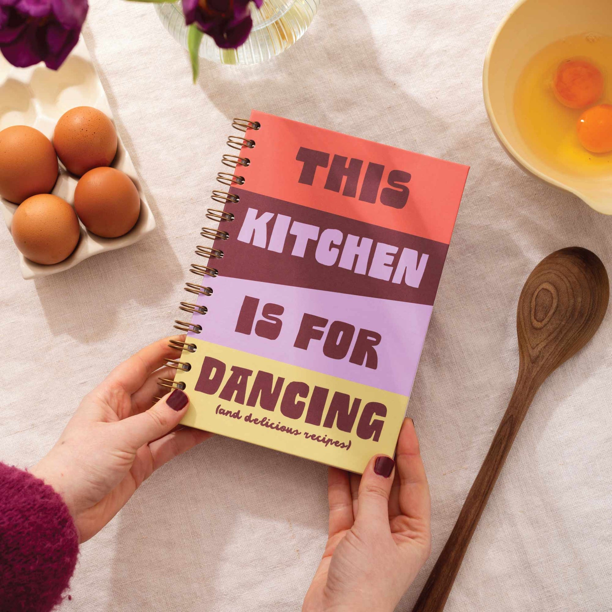 Kitchen Dancing A5 Recipe Journal with vibrant apricot and lilac cover