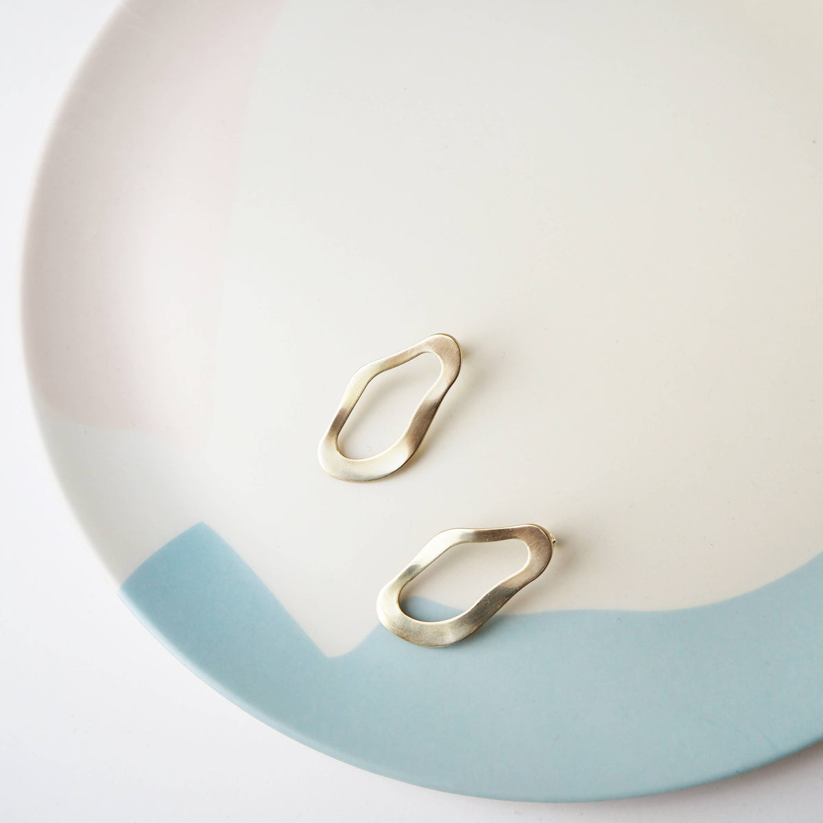 Elegant gold tone brass statement earrings