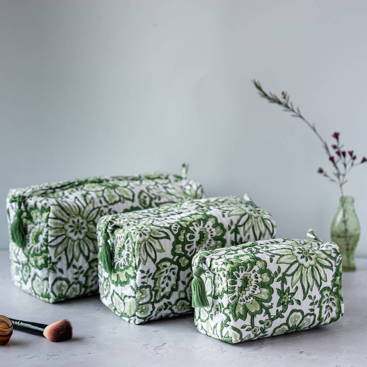 Close up of handmade Meadow block print cosmetic bag