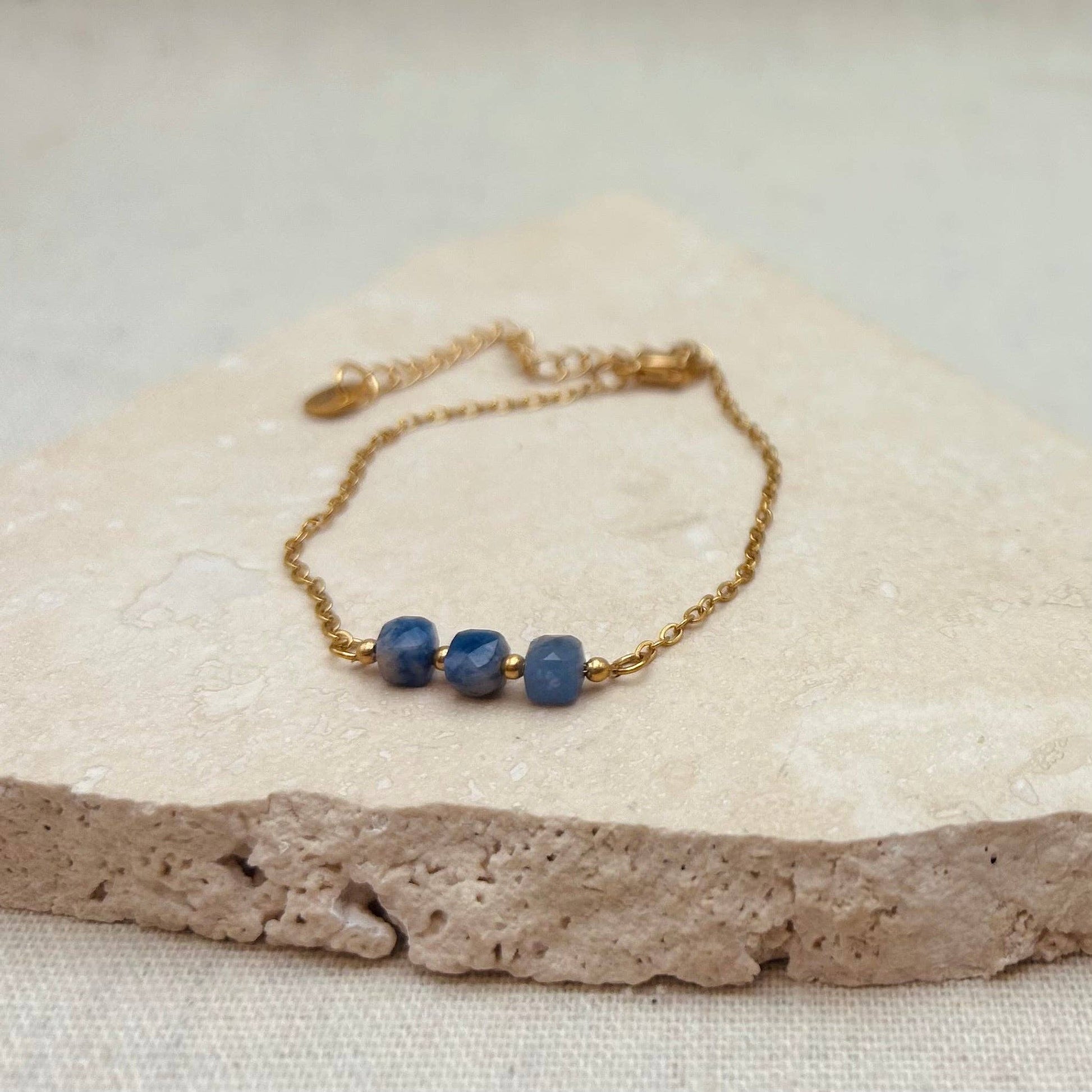 Little Nell lapis trio bead bracelet, gold-plated, waterproof, adjustable chain, and celestial blue lapis lazuli beads