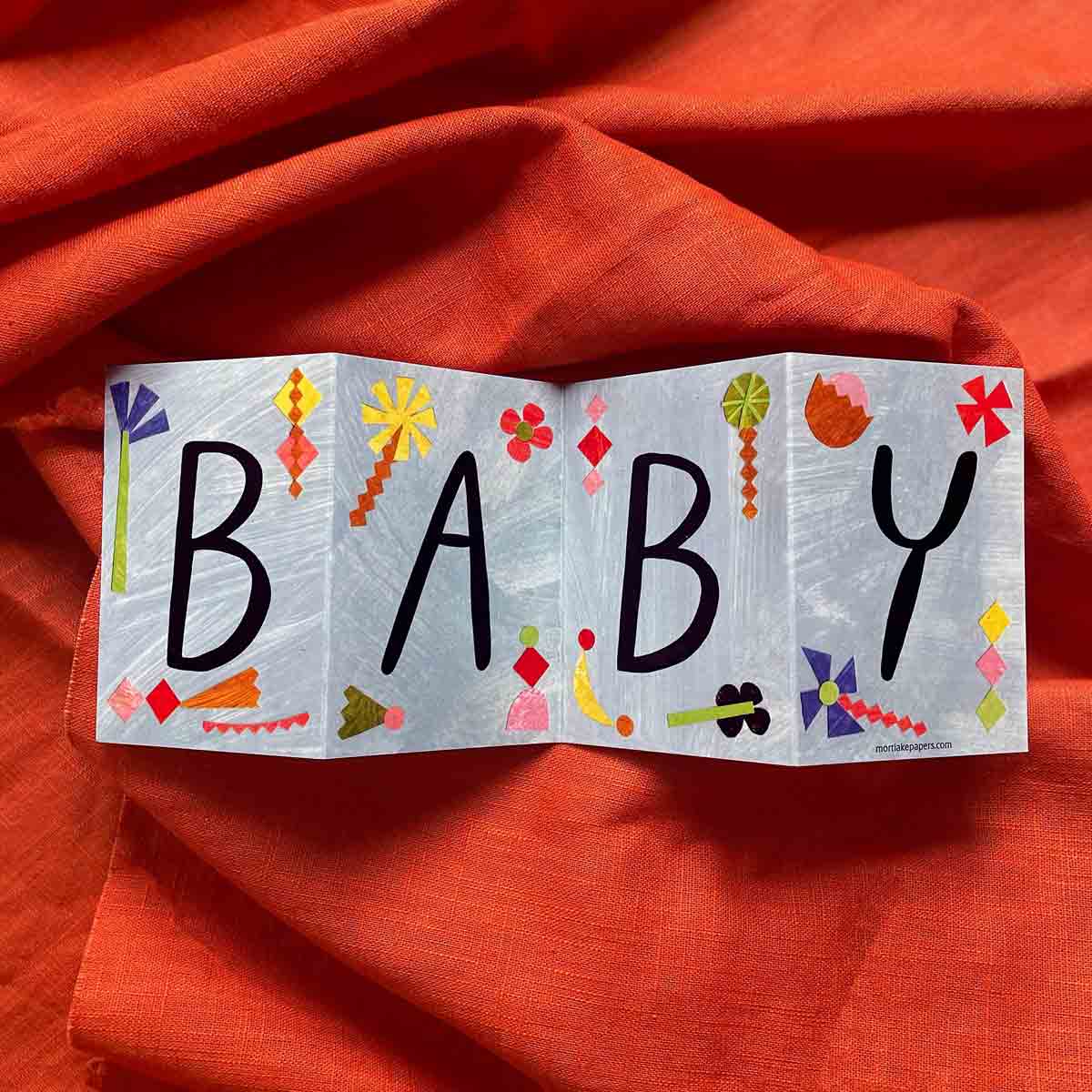 Eco-friendly Baby Concertina Greeting Card with recycled vegan envelope and plastic-free packaging